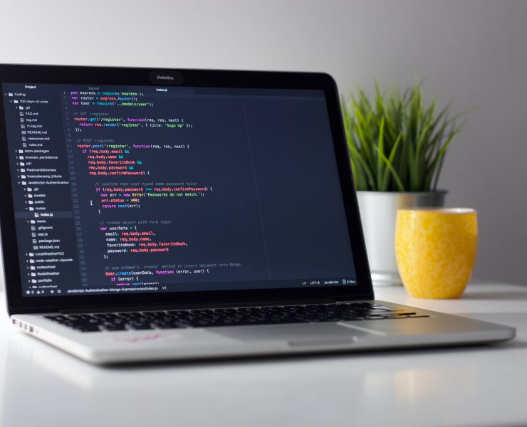 open-laptop-with-code-on-screen